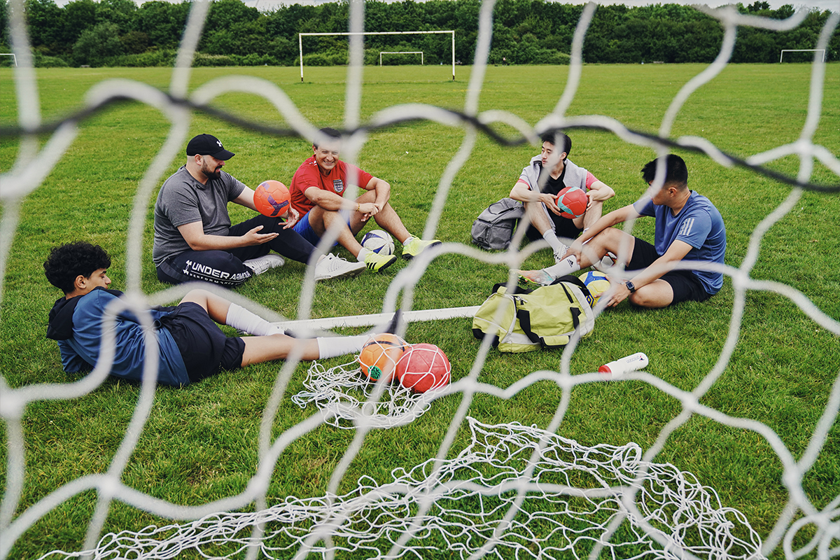 Players chatting behind a net